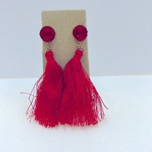 Red multiple strand dangle earrings